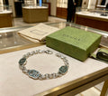 Gucci Silver-Tone GG Medallion Link Bracelet - album image 1