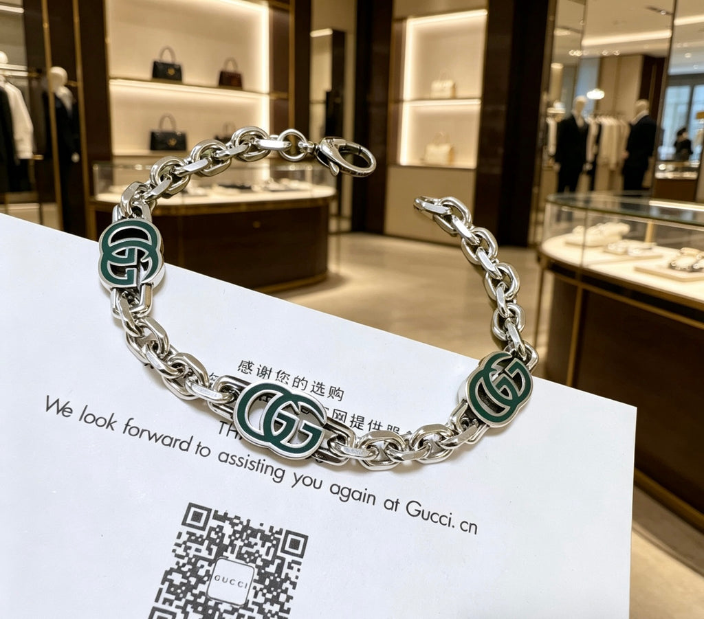 Gucci Silver-Tone GG Medallion Link Bracelet - album image 8