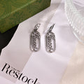 Gucci Silver-Tone Long Leaf Drop Earrings - album image 1