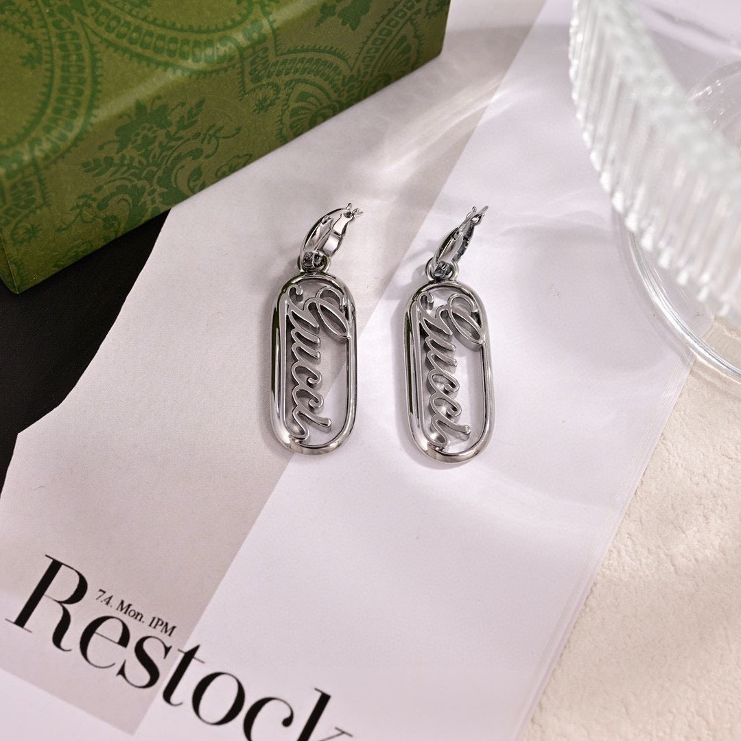 Gucci Silver-Tone Long Leaf Drop Earrings - album image 1