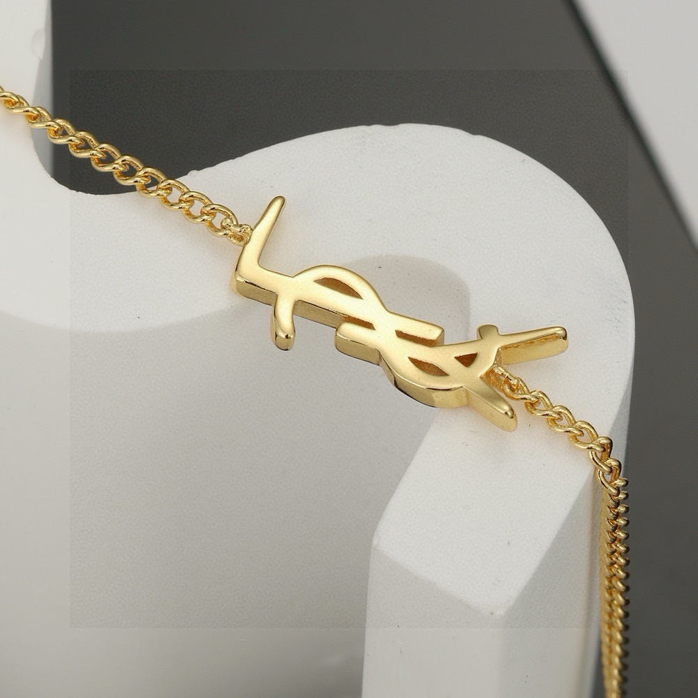 Saint Laurent Gold-Tone Monogram Pendant Necklace - album image 3