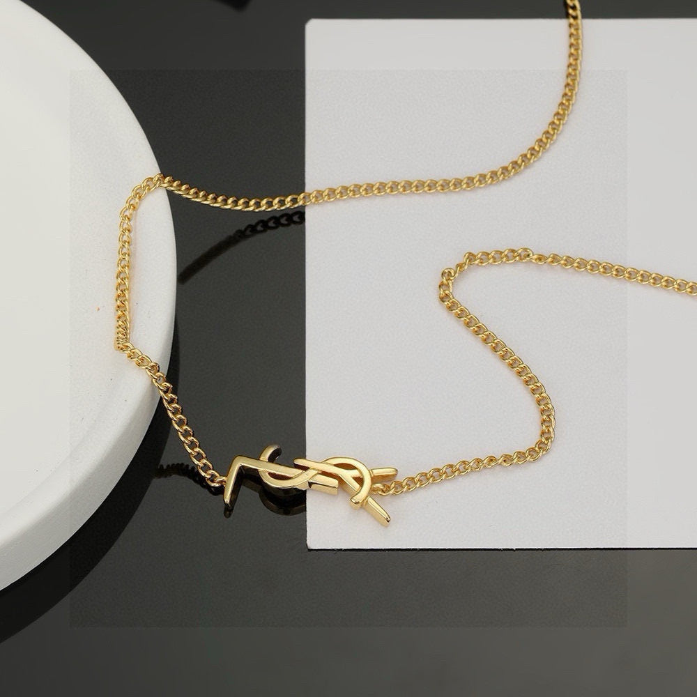 Saint Laurent Gold-Tone Monogram Pendant Necklace - album image 5