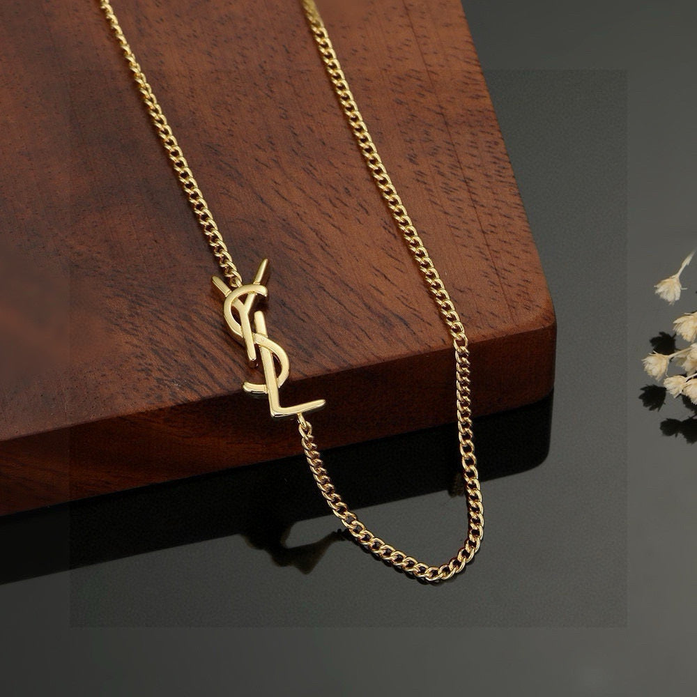 Saint Laurent Gold-Tone Monogram Pendant Necklace - album image 8