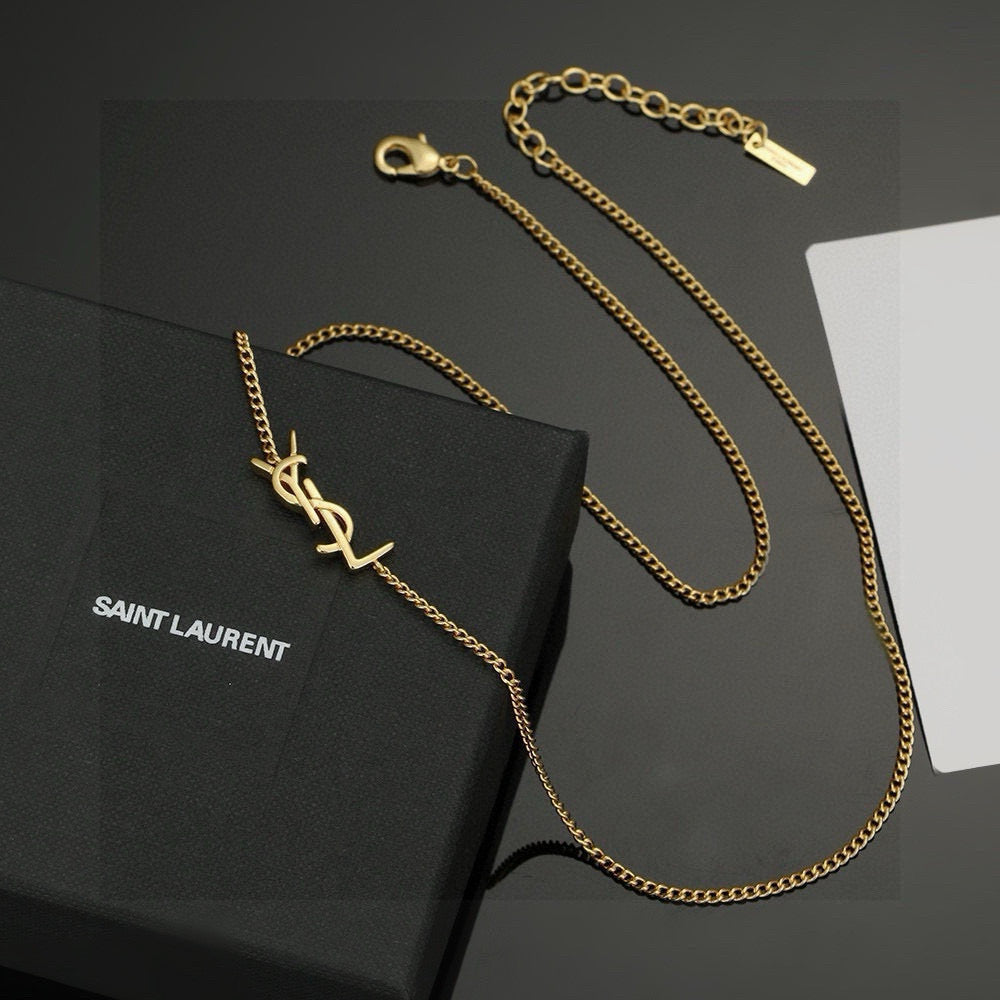 Saint Laurent Gold-Tone Monogram Pendant Necklace - album image 1