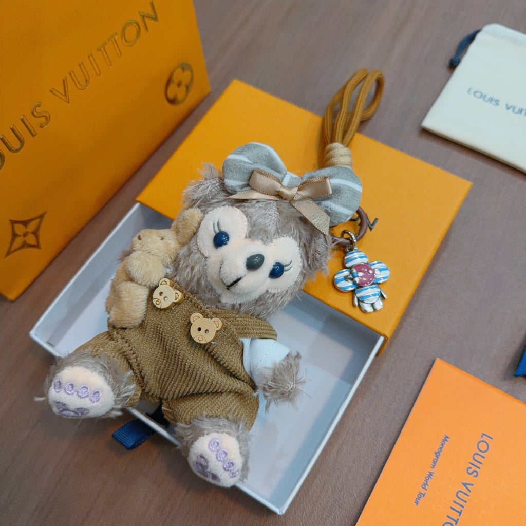 Louis Vuitton Gray Plush Character Keychain in Tan Outfit - album image 6