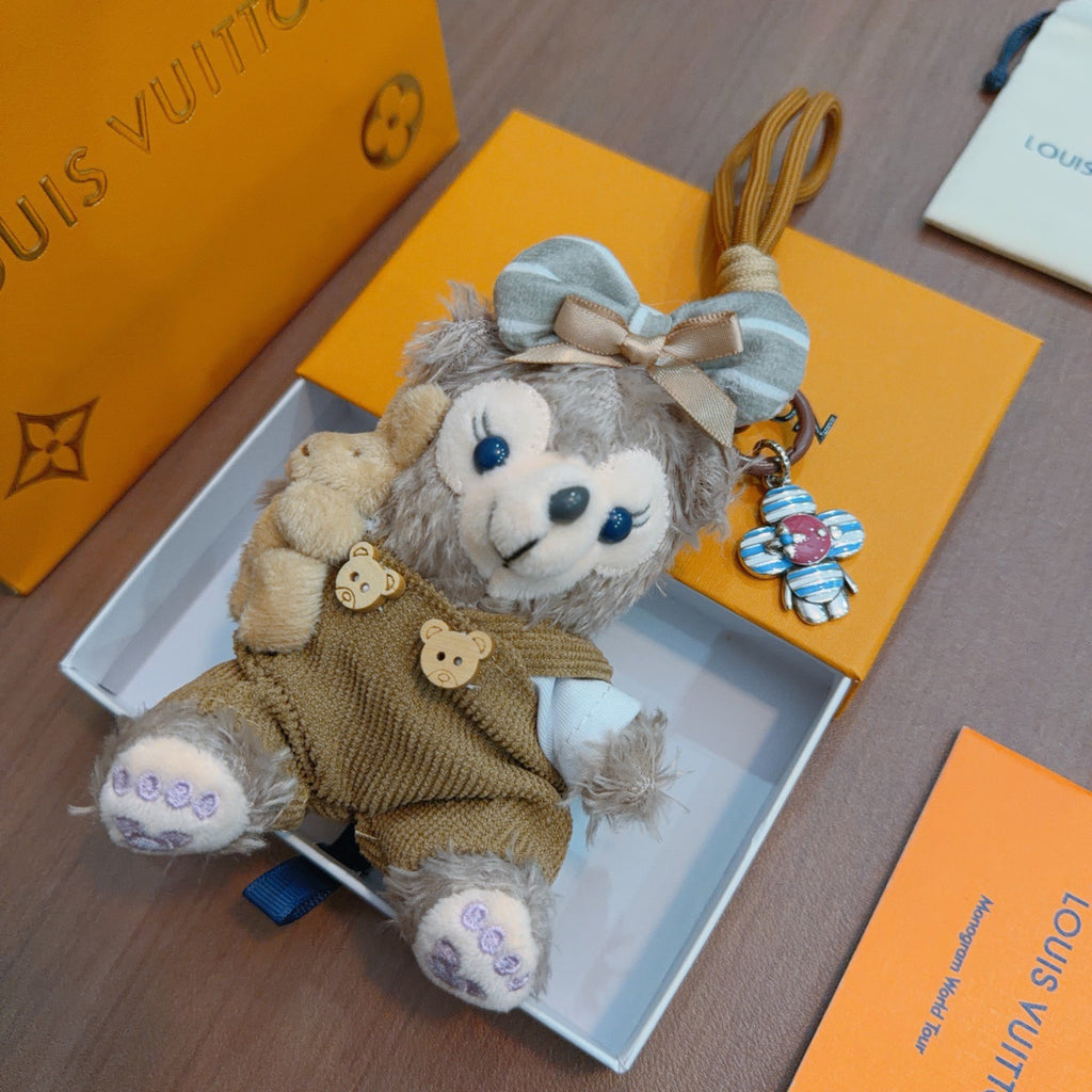 Louis Vuitton Gray Plush Character Keychain in Tan Outfit - album image 7