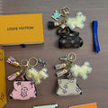 Louis Vuitton Character Keychain with Mini Bag Charm in Multiple Colors - album image 1