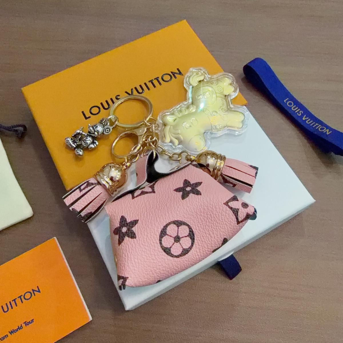 Louis Vuitton Yellow Character Keychain with Pink Monogram Tag - album image 4