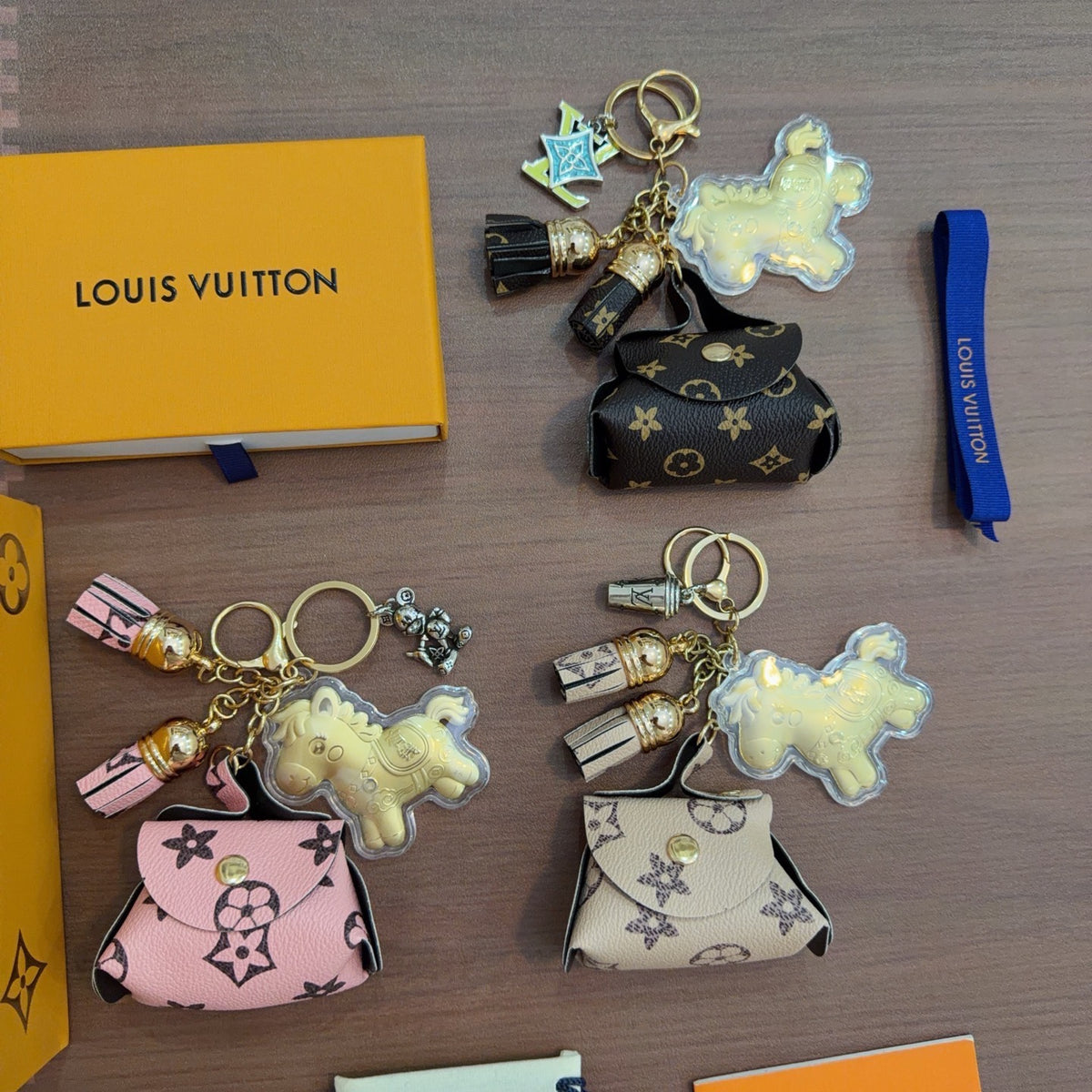 Louis Vuitton Yellow Character Keychain with Pink Monogram Tag - album image 3