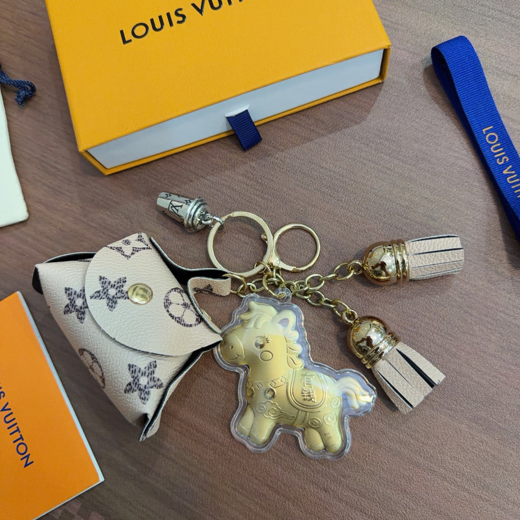 Louis Vuitton Mint Character Keychain with White Monogram Tag - album image 1