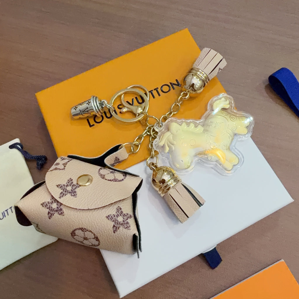 Louis Vuitton Mint Character Keychain with White Monogram Tag - album image 5