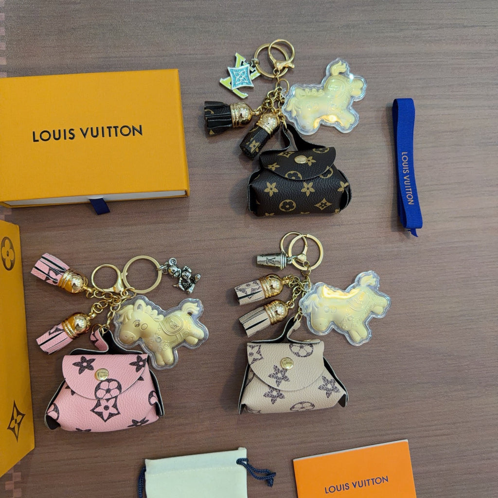 Louis Vuitton Mint Character Keychain with White Monogram Tag - album image 6