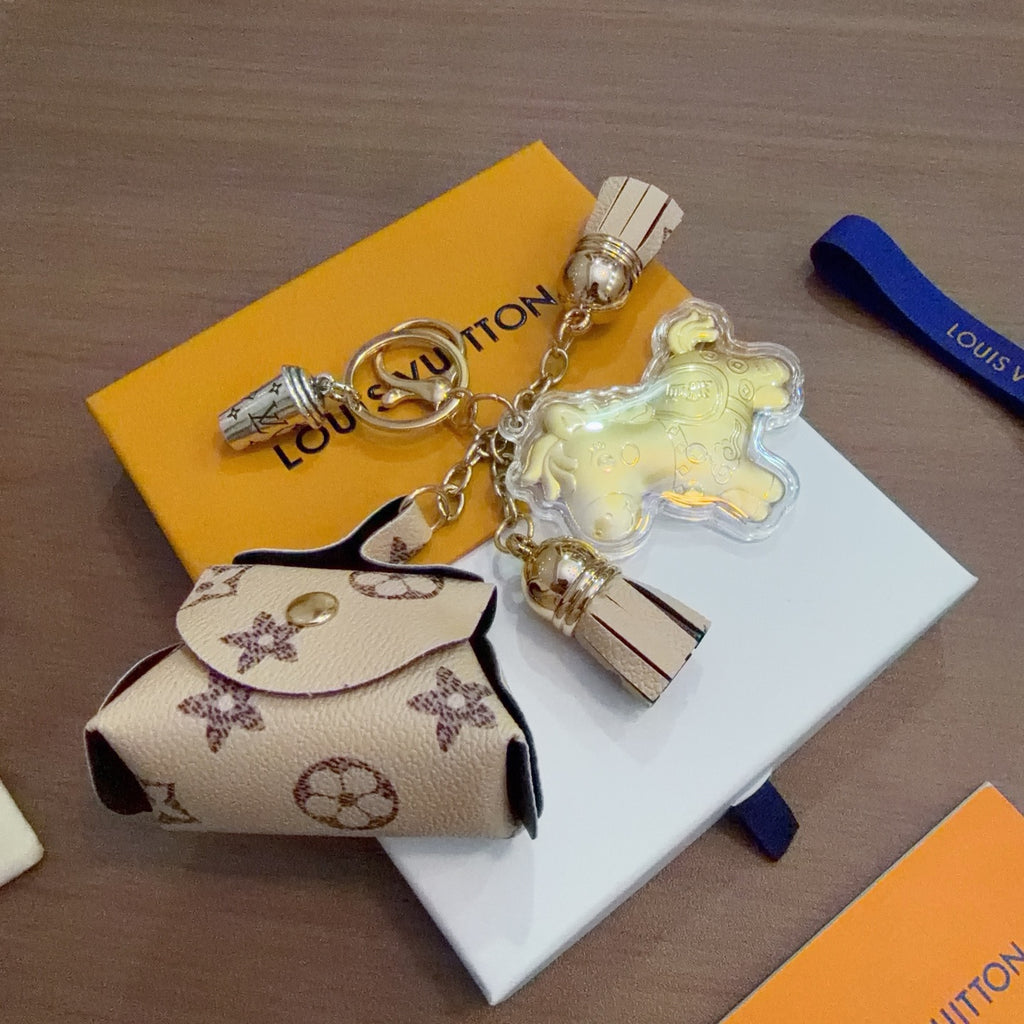 Louis Vuitton Mint Character Keychain with White Monogram Tag - album image 2
