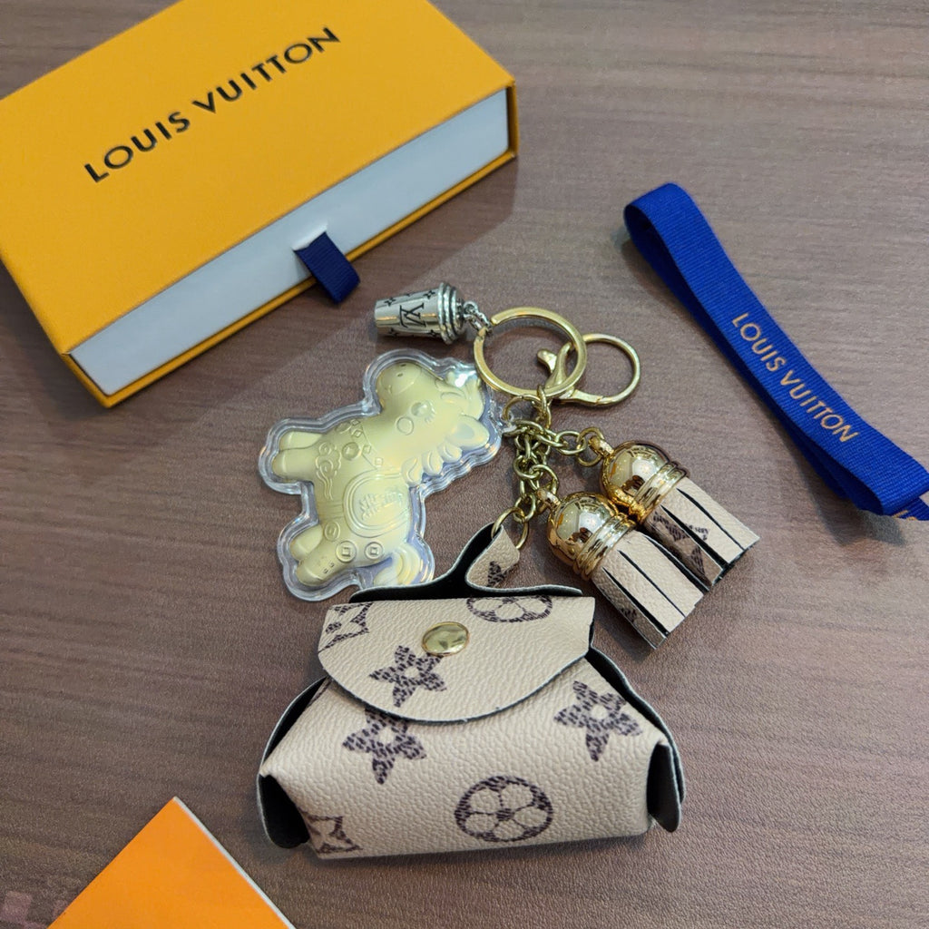 Louis Vuitton Mint Character Keychain with White Monogram Tag - album image 4