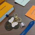 Louis Vuitton White Flower and Monogram Disc Keychain - album image 1