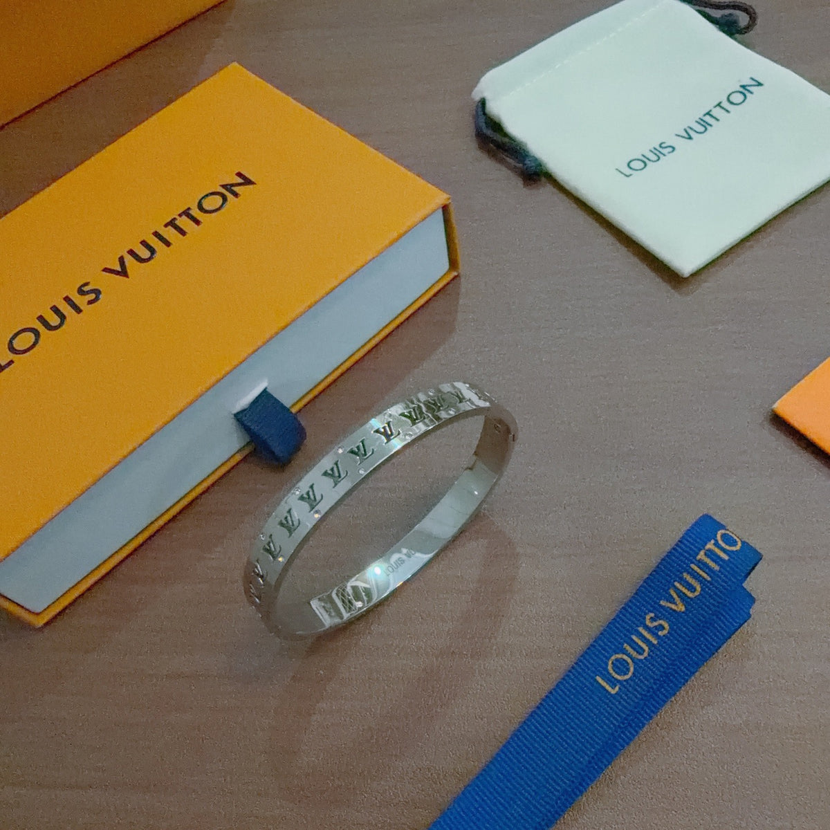 Louis Vuitton Pale Blue Engraved Open Bangle - album image 1