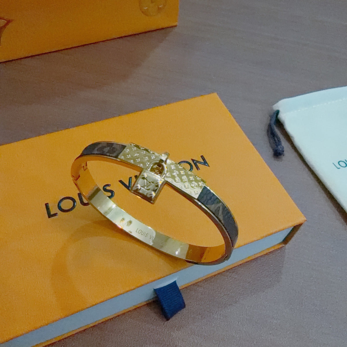 Louis Vuitton Gold-Tone Engraved Open Bangle - album image 3