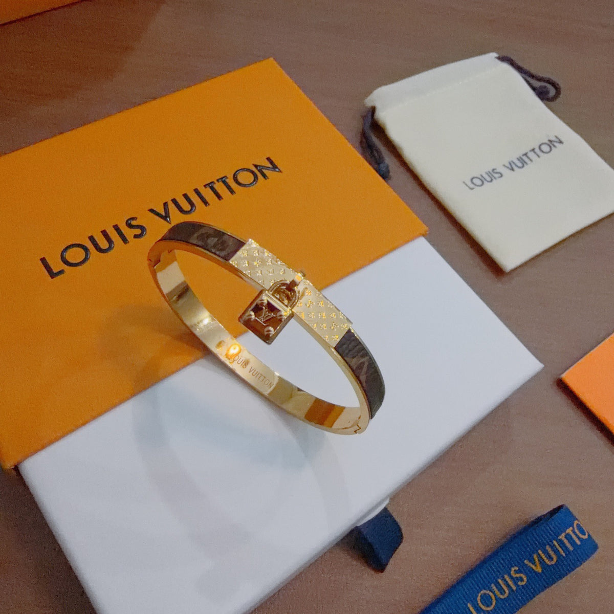 Louis Vuitton Gold-Tone Engraved Open Bangle - album image 1