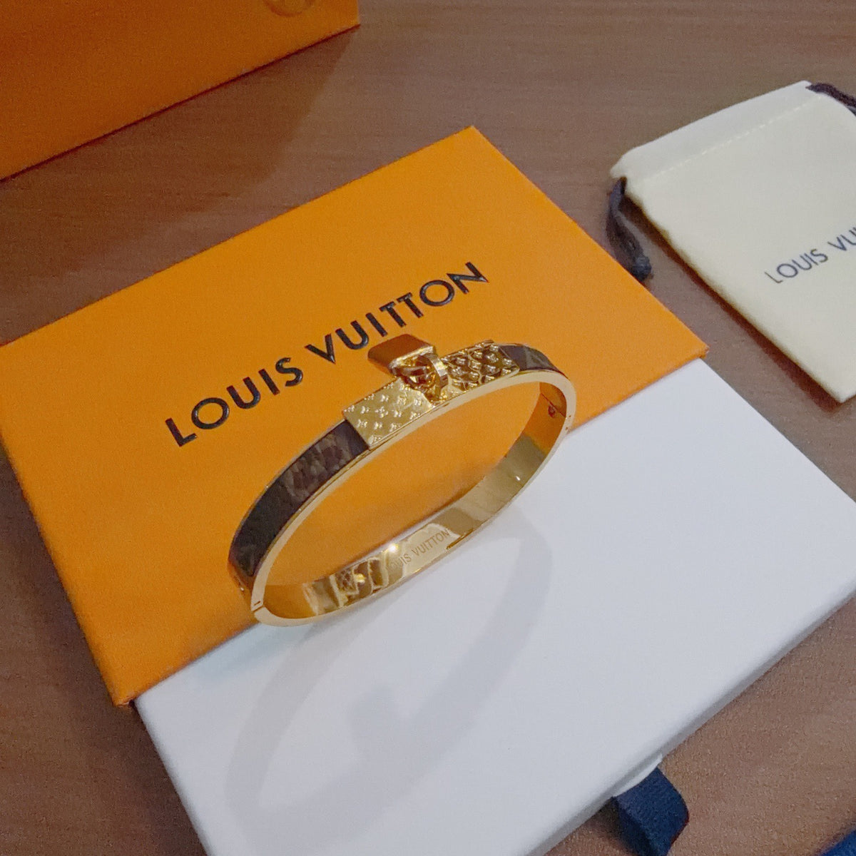 Louis Vuitton Gold-Tone Engraved Open Bangle - album image 4