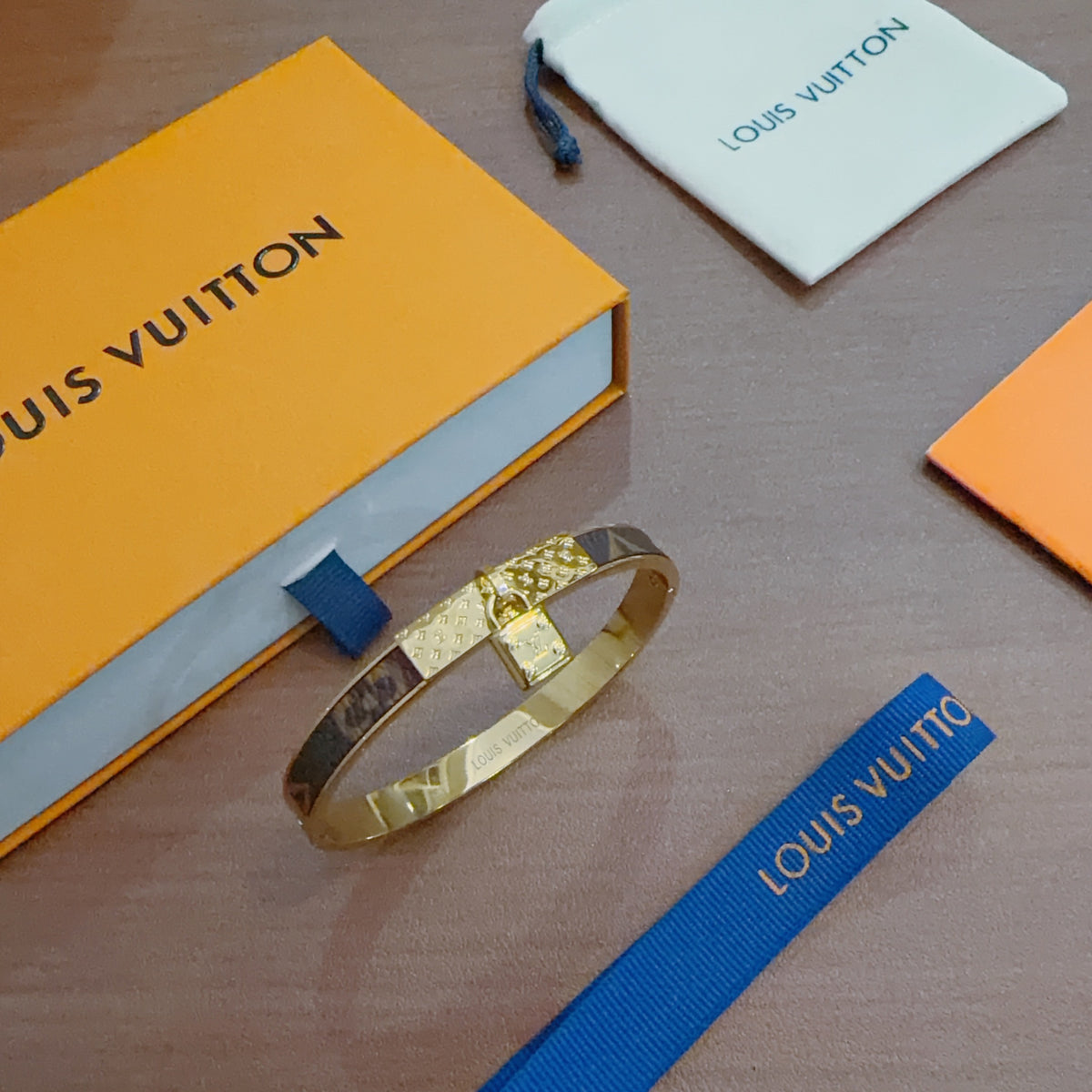 Louis Vuitton Gold-Tone Engraved Open Bangle - album image 5