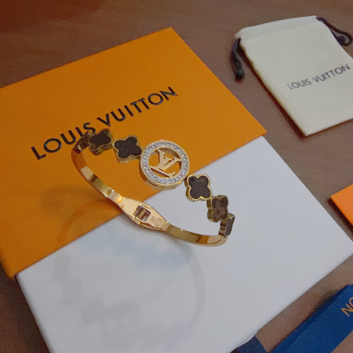 Louis Vuitton Gold-Tone Round-End Open Bangle - album image 5