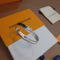 Louis Vuitton Silver-Tone Engraved Open Bangle - album image 1