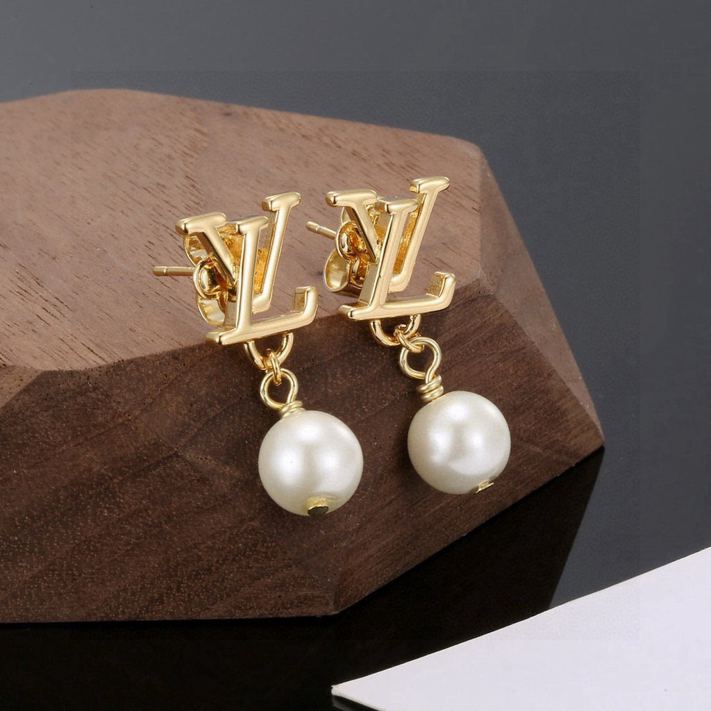 Louis Vuitton LV Letter Stud Earrings - album image 5