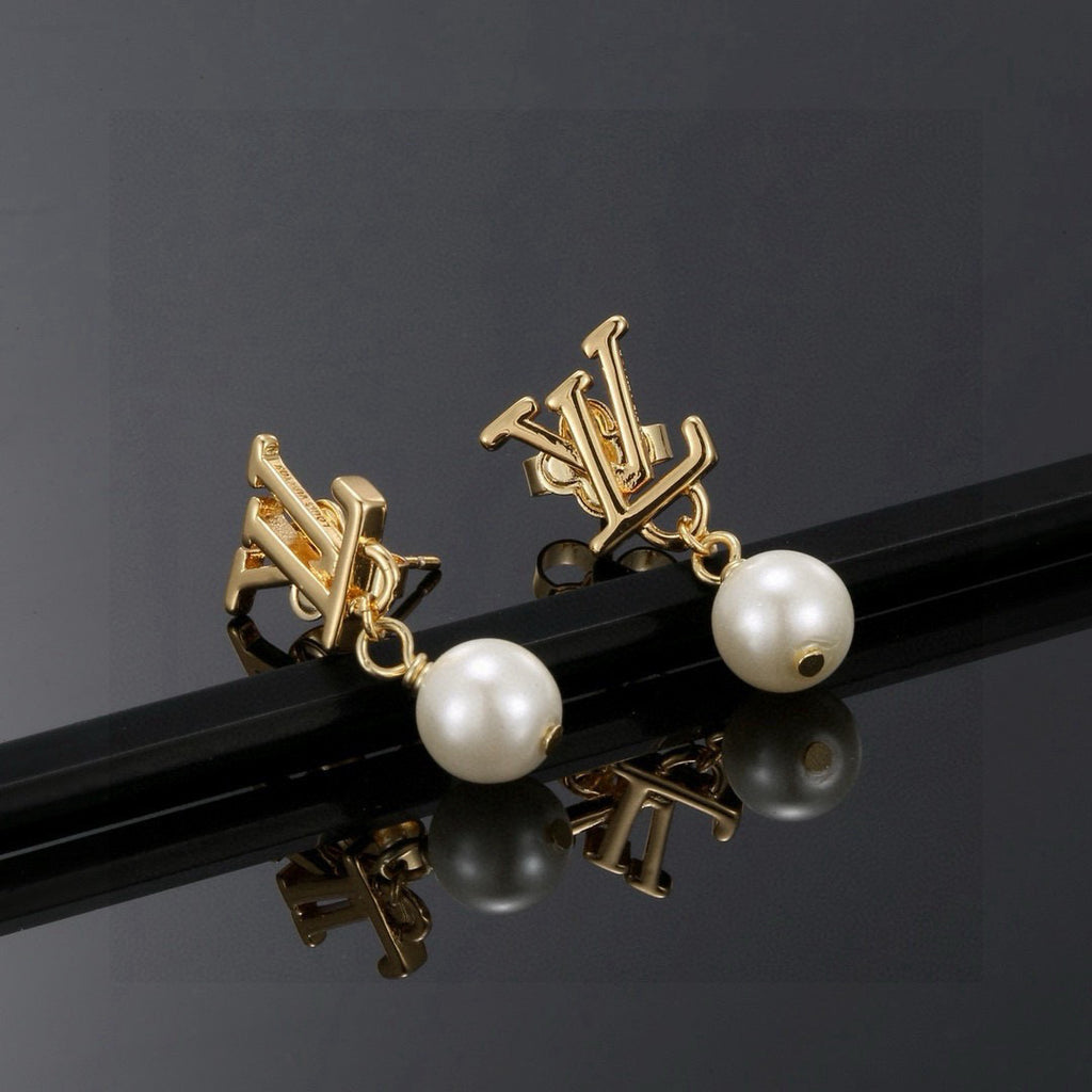 Louis Vuitton LV Letter Stud Earrings - album image 9