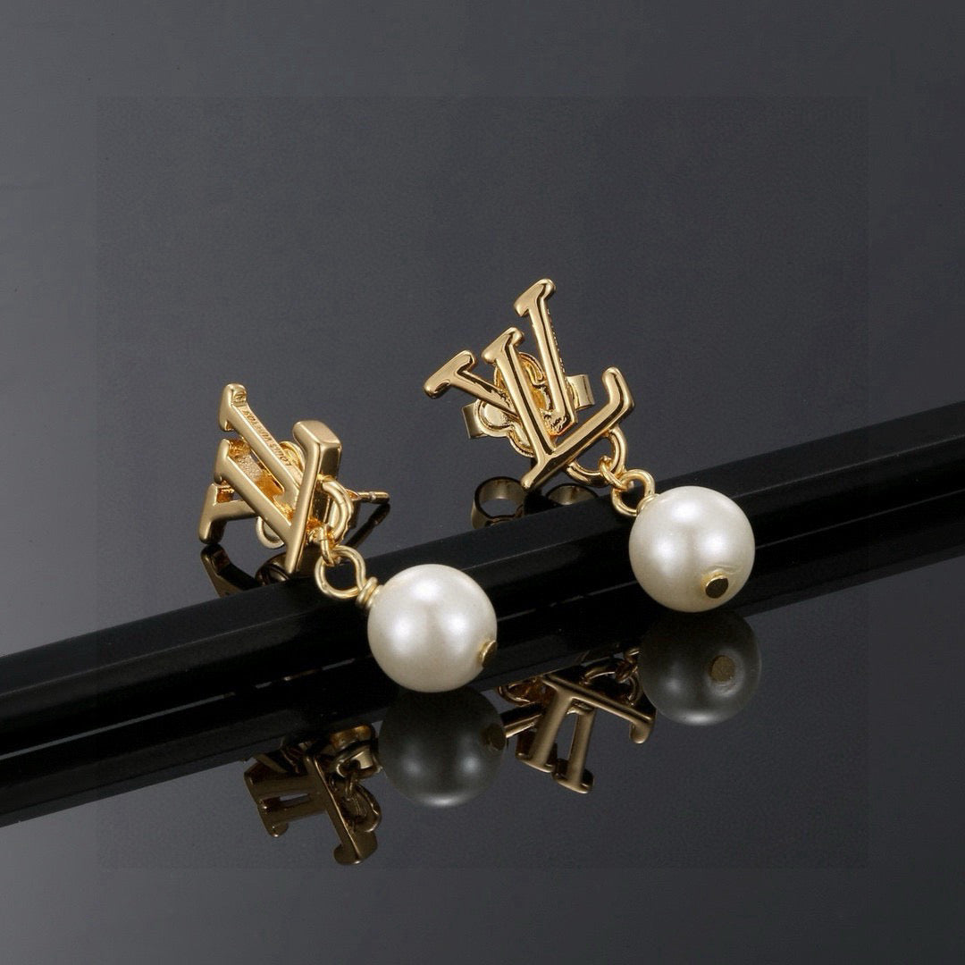 Louis Vuitton LV Letter Stud Earrings - album image 9