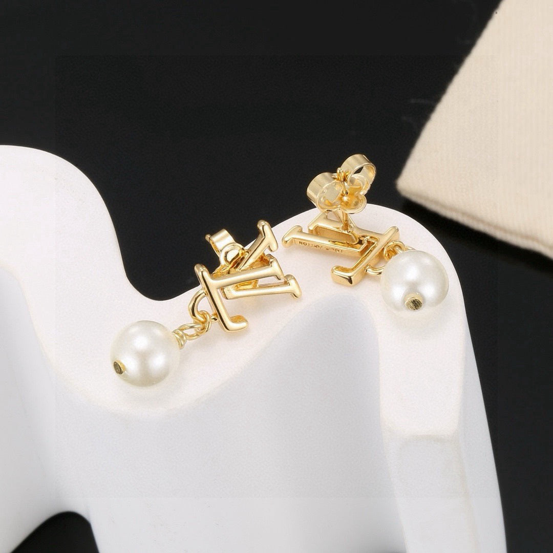 Louis Vuitton LV Letter Stud Earrings - album image 7