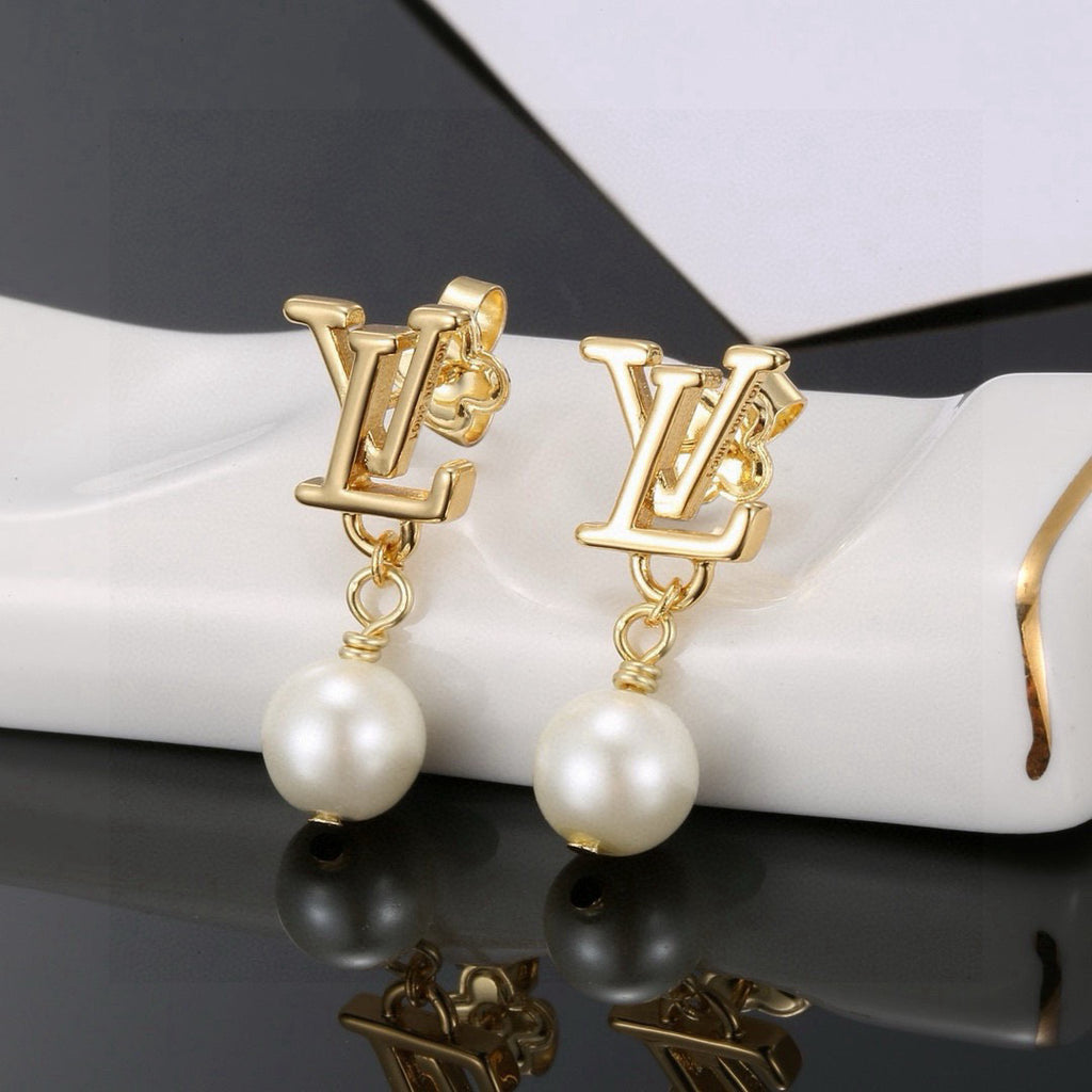 Louis Vuitton LV Letter Stud Earrings - album image 8