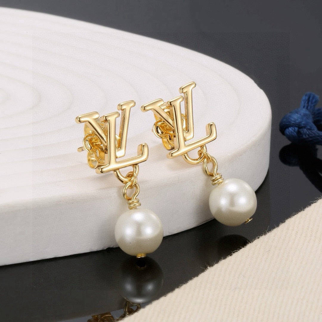 Louis Vuitton LV Letter Stud Earrings - album image 2