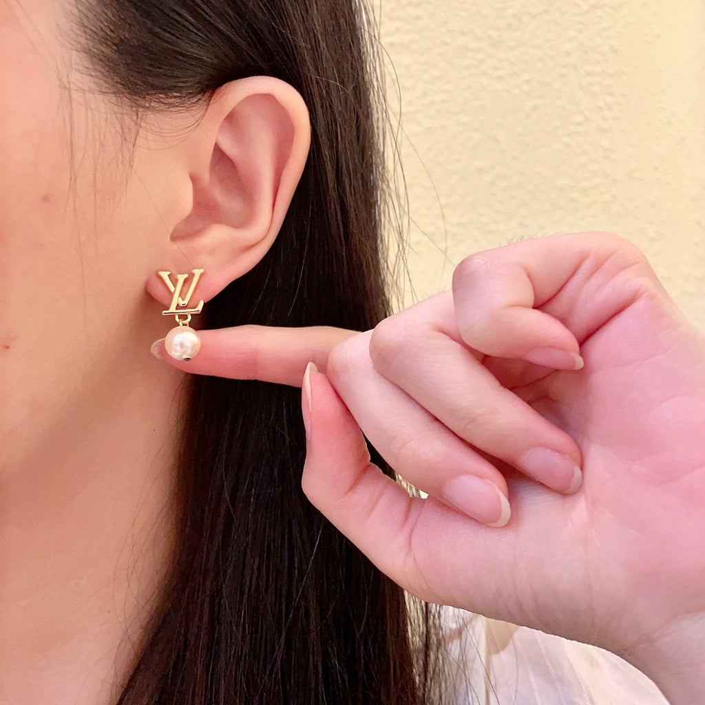 Louis Vuitton LV Letter Stud Earrings - album image 6