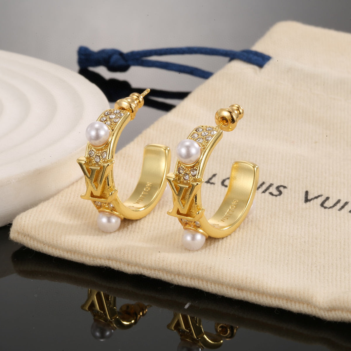 Louis Vuitton LV Letter Stud Earrings - album image 2