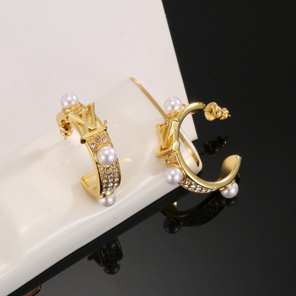 Louis Vuitton LV Letter Stud Earrings - album image 3
