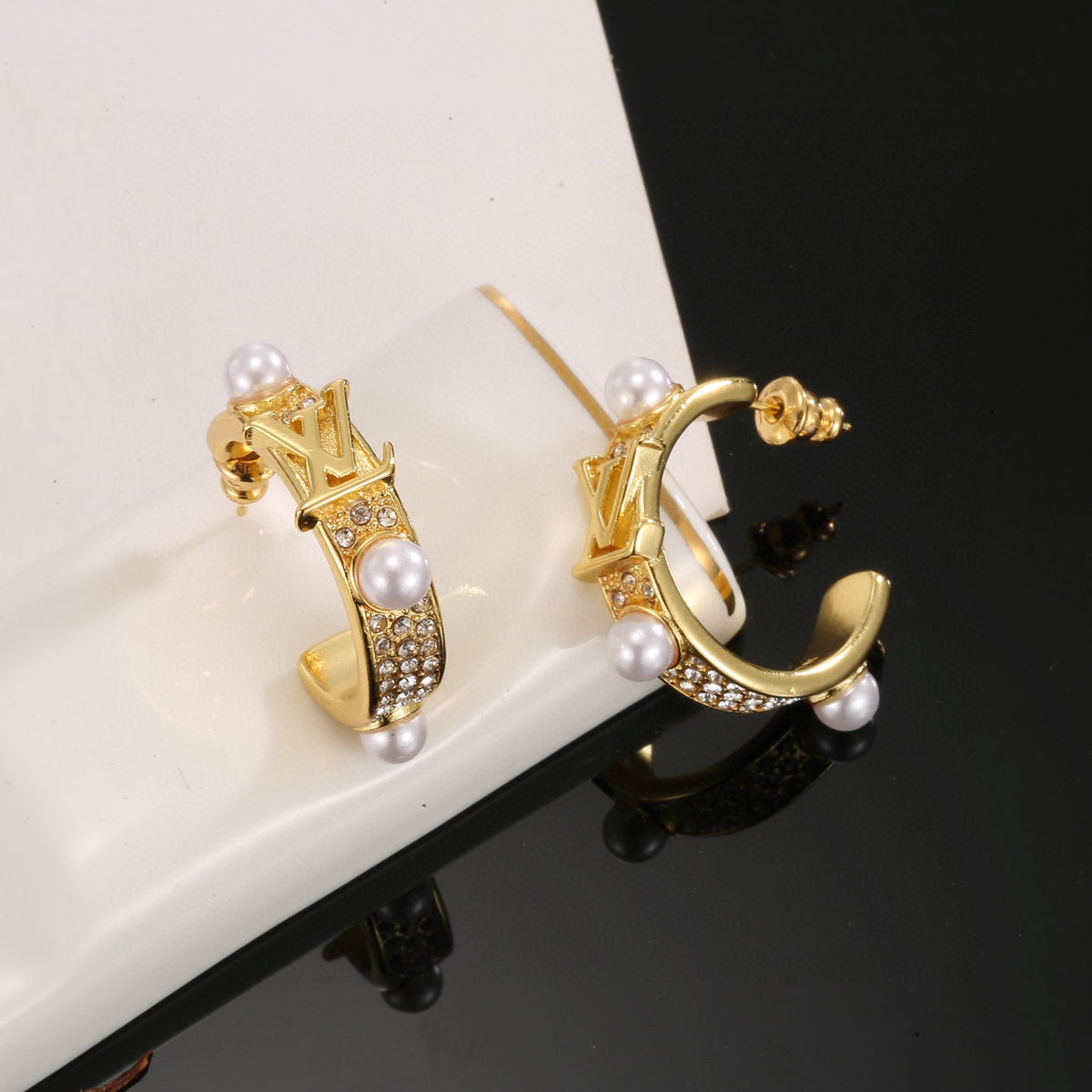Louis Vuitton LV Letter Stud Earrings - album image 3