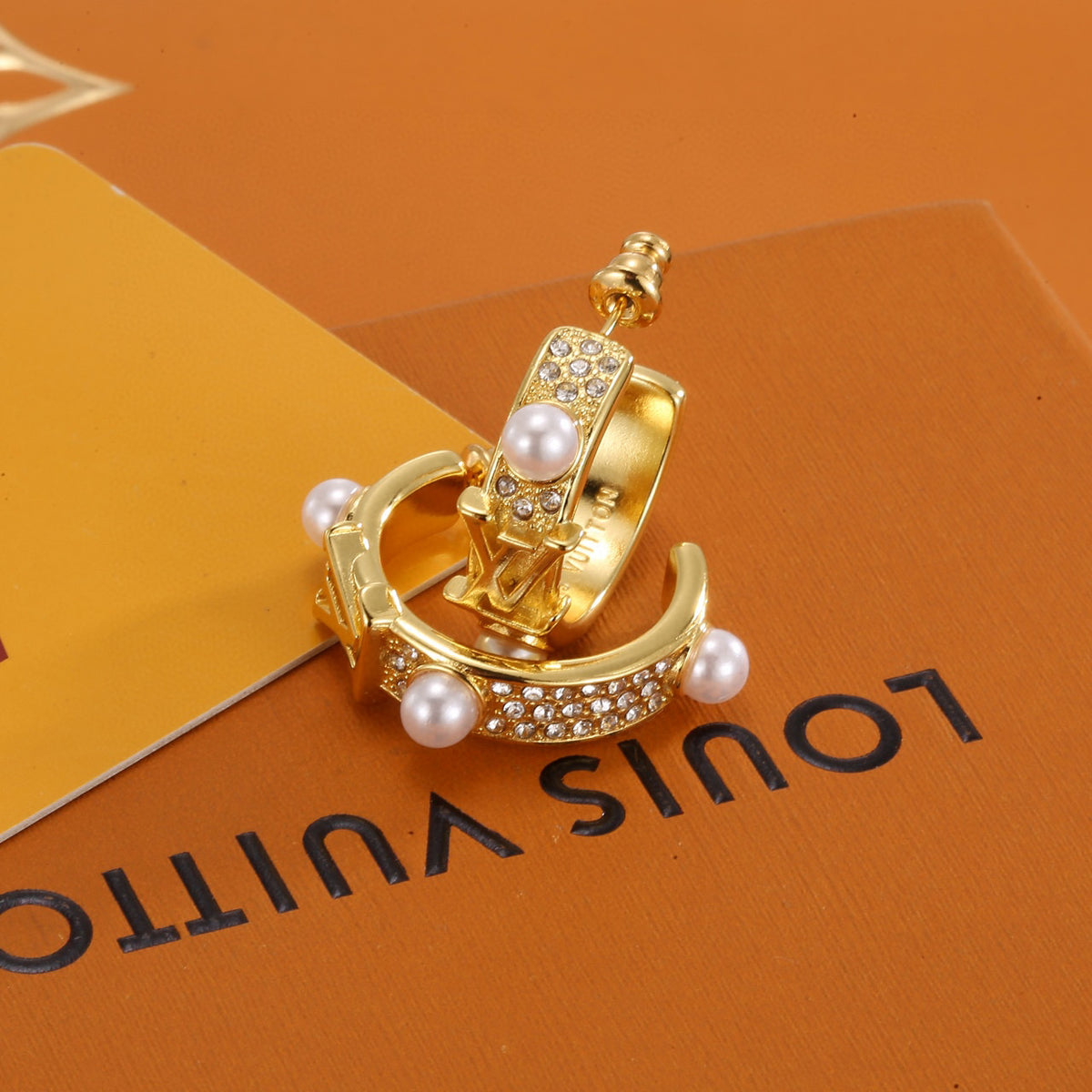 Louis Vuitton LV Letter Stud Earrings - album image 6