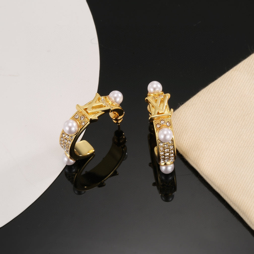 Louis Vuitton LV Letter Stud Earrings - album image 4