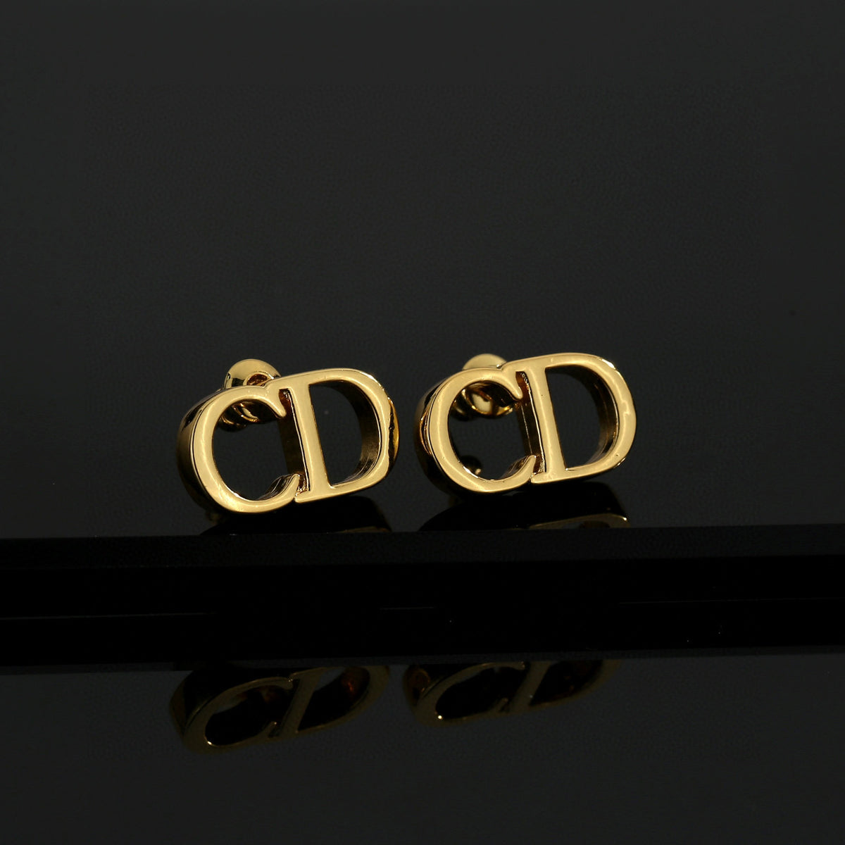Dior Minimal Gold-Tone CD Stud Earrings - product image 1