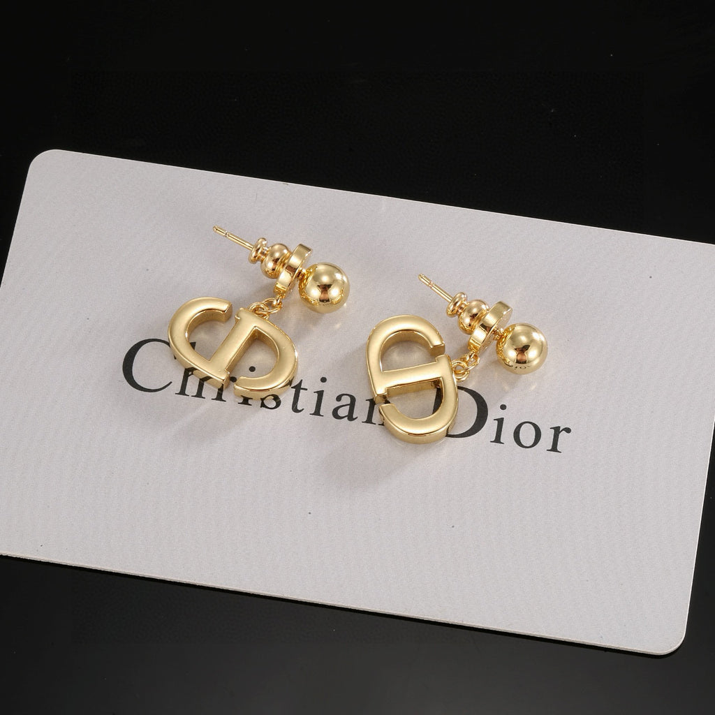 Dior Star-Topped CD Earrings - product image 1