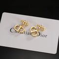 Dior Star-Topped CD Earrings - product image 1