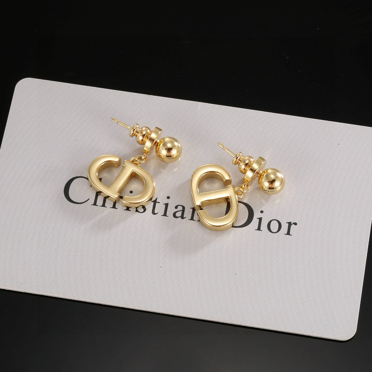 Dior Star-Topped CD Earrings - product image 1