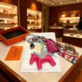 Hermès Pink Leather Horse Keychain with Tassel - album image 1
