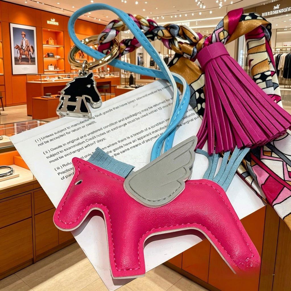 Hermès Pink Leather Horse Keychain with Tassel - album image 6