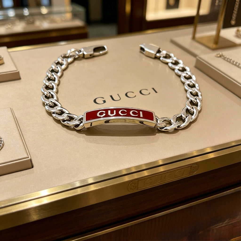 Gucci Silver-Tone Plaque Chain Bracelet with Red Detail - album image 1