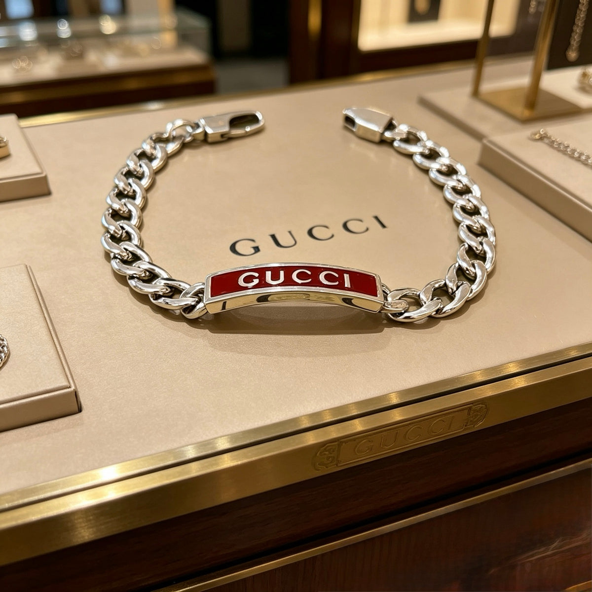 Gucci Silver-Tone Plaque Chain Bracelet with Red Detail - album image 1