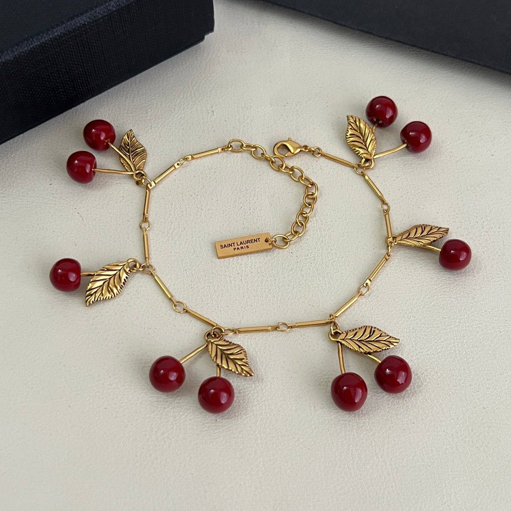 Saint Laurent Antique Gold-Tone Red Accent Bracelet - album image 8