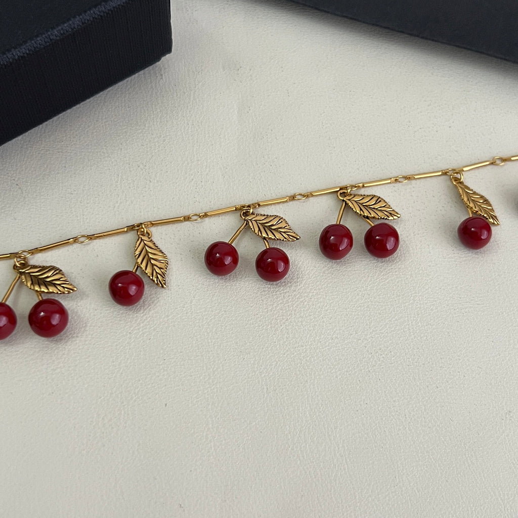 Saint Laurent Antique Gold-Tone Red Accent Bracelet - album image 9