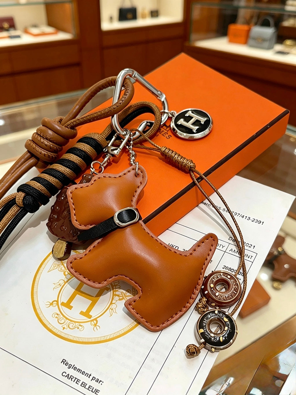 Hermès Tan Leather Horse-Charm Keychain - album image 1