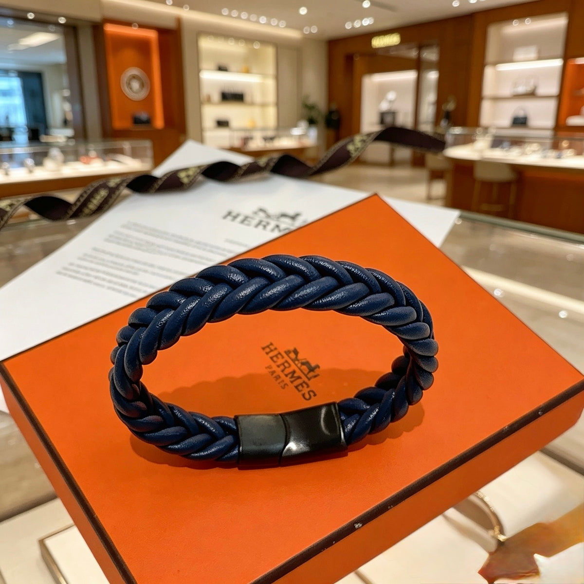 Hermès Navy Braided Leather Bracelet - album image 1